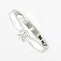 Ring, diamant ca 0,15ct, kapad kulett,  stl 16¼, bredd 2-4mm, höjd 6mm, vitguld, 18K, Vikt: 3,2 g