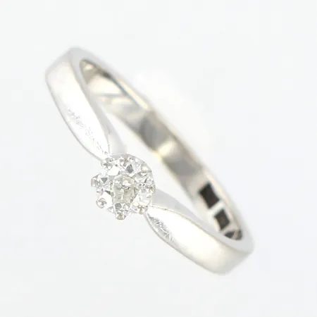 Ring, diamant ca 0,15ct, kapad kulett,  stl 16¼, bredd 2-4mm, höjd 6mm, Juvelerare G Arenhill år 1966 vitguld, 18K, Vikt: 3,2 g