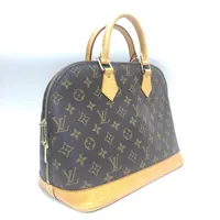 Väska Louis Vuitton Alma monogram canvas med läderdetaljer,  datumkod: FL0023, H:25cm, L:31cm, D:16,5cm, hänglås och nyckel, inga övriga tillbehör.