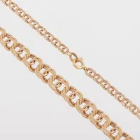 Collier Bismarck, Nordiska Juvelaktiebolaget Stockholm, längd ca 38 cm, bredd 3.4-7.1 mm, 18k. Vikt: 14 g