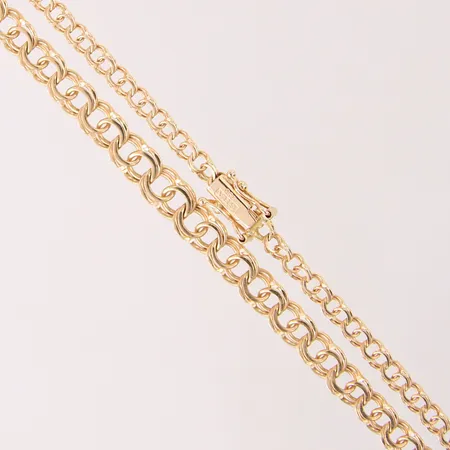 Collier Bismarck, doserad, längd 51cm, bredd 3,2-5,8mm, 18K.  Vikt: 12,4 g