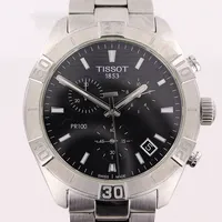 Herrur Tissot PR100, stål, quartz, Ø43mm, svart urtavla, kronograf, T101617A,  serie nr EHR Q5Z FYL, stållänk med viklås 20cm, inga tillbehör.