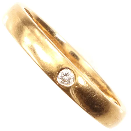 Ring med diamant 0,03ct, stl 17½, bredd ca 3mm, repig, 18K Vikt: 3 g