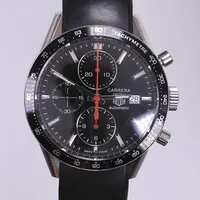 Herrur Tag Heuer Carrera Juan Manuel Fangio special edition, Ø41mm, automat, kronograf, datum, cal. 16 (baserad på ETA 7750), armband gummi med viklås, kosmetisk bruksslitage, inga tillbehör. OBS! Ej fungerande, akut servicebehov, säljes som reparationsobjekt