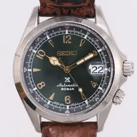 Herrur Seiko Prospex Alpinist, Ø39,3mm, borstat/polerat stål, ref 6R35-00E0, automatisk, ser nr 131794, 20bar, glasbaksida, safirglas, datum, grön urtavla, originalband, viklås, repor, slitage, inga tillbehör