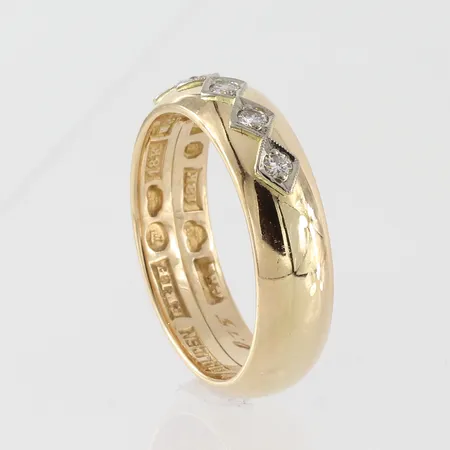 Ring med diamanter ca 5x0,03ct, stl 19½mm, bredd 6,2mm,  två ringar ihopsatta, 18k Vikt: 10 g