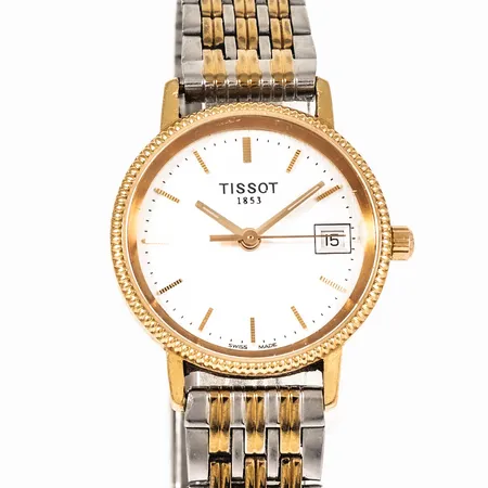 Damur Tissot i 18K guld med metallband. Boett Ø 24 mm med gravyr 