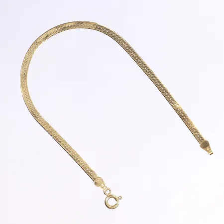 Armband, 17,5cm, bredd 3mm, brutna länkar, 18K Vikt: 3,4 g