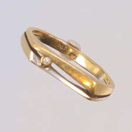 RIng med diamant 1x0,01ct, vitguld/rödguld, stl 18, bredd 3mm, GHA, 18K  Vikt: 3,6 g