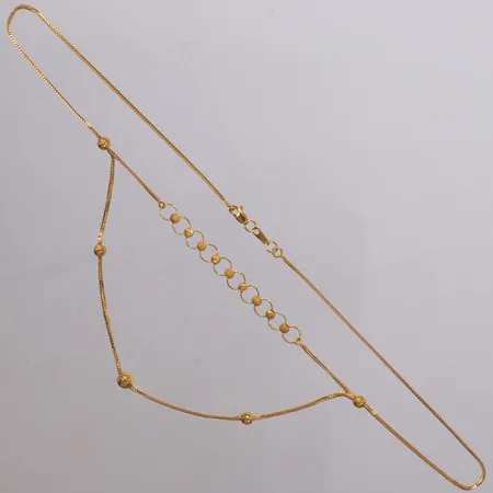 Collier med kuldetaljer, längd 42cm, bredd 1,2-5,6mm, 21K  Vikt: 6,7 g