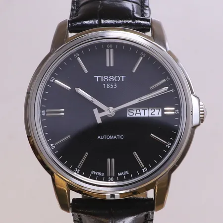 Herrur Tissot III, stål, automatisk, 39mm, refnr T065430A, serienr 12JA0470816, glasbaksida, dag, datum, läderarmband, viklås, manual, garantikort Klockia daterat 12/6-13, box. 