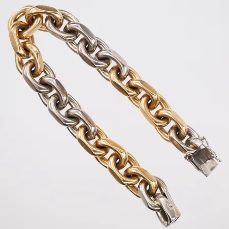 Armband, Ankarlänk, längd 18½cm, bredd 10mm, tillverkad av Bröderna Hedens Guldsmeds AB, Stockholm 1964, 18K guld samt vitguld Vikt: 102,5 g