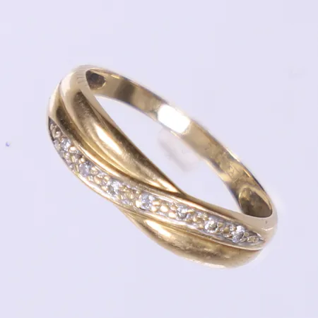 Ring med diamanter totalt ca 0,04ctv, stl 17¾, bredd 2-5mm, 18K Vikt: 1,9 g