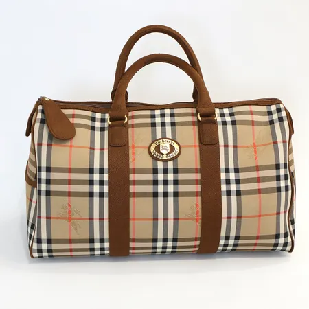 Väska Burberry, weekendbag, Nova check-mönstrad canvas samt brunt moccaläder, Top-handle handtag, ett ytterfack. Invändigt fodrad med svart läderimitation. Märkt "Burberrys". Längd 45 cm, bredd 23, höjd 25 cm., inga tillbehör  Vikt: 0 g