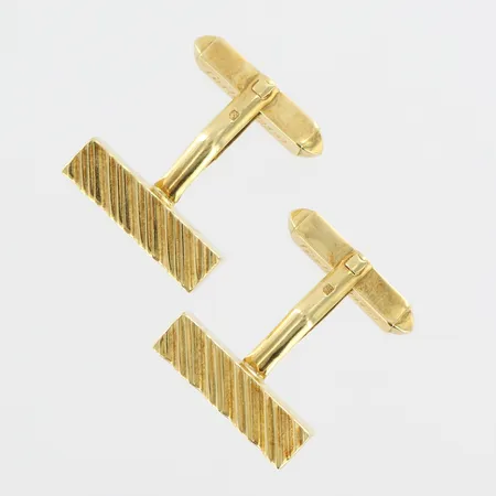 Manschettknappar, Cartier, serienummer 79397,  inventarienummer R7611, mått 20x5mm, engelska kontrollstämplar,  med originaletui, 18K guld. Vikt: 11 g
