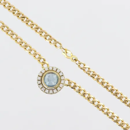 Collier med diamanter ca 0,36ctv och cabochonslipad blå sten, hänge i 14K, ca 52cm, bredd ca 4-16mm, 18K Vikt: 31,9 g