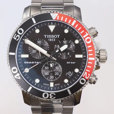 Herrur Tissot Seastar Ø45,5mm,  ref nr. T120417A, snr. QJH-GVL-1L6, 30 bar, kronograf (nollställer ej korrekt), quartz, stållänk med repor, med box, manual och kvitto 