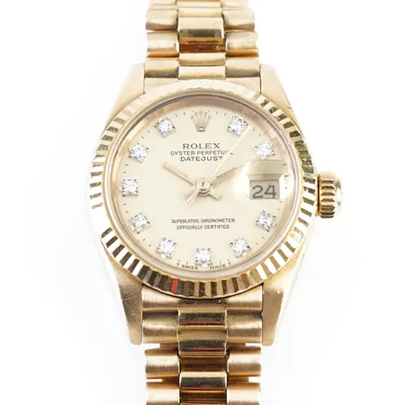 Damur Rolex Datejust 26, helguld med diamanttavla, 26Ref:69178, serie nr: 9514581, box ej cert,  klockan är från 1986 i bra skick för sin ålder.