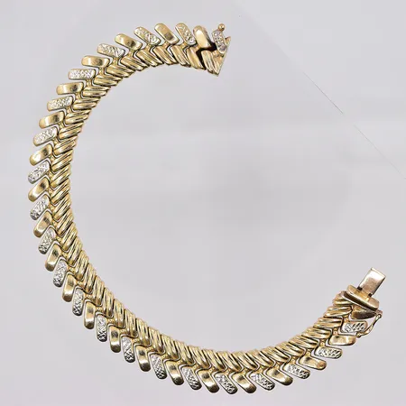 Armband, 19,5cm, bredd 12mm, vitguldsdetaljer,14K Vikt: 21,7 g