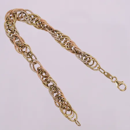 Armband trefärgat, ca 19,5cm, bredd 8mm. 18K Vikt: 6,9 g