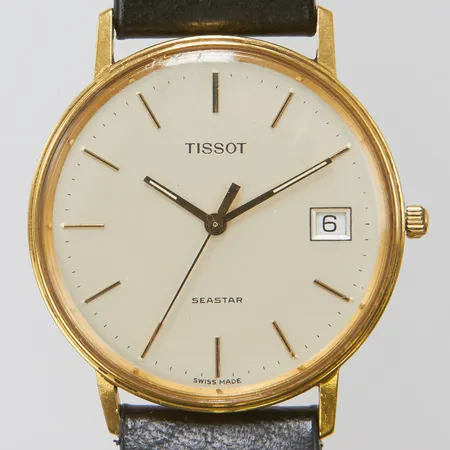 Herrur Tissot Seastar, 18K, quartz, 33,5mm, opersonlig gravyr, batteribyte, läderband samt bygelspänne Hirsch, inga tillbehör Vikt: 0 g