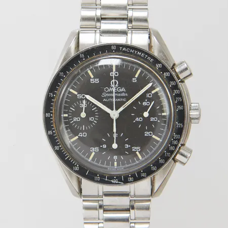 Herrur Omega Speedmaster Reduced, stål, automatisk, 39mm, ref: 175 0032/3, snr: 51686219 ca 1989, Cal. 1140, kronograf, repigt glas, repig ring, stållänk, ref: 1469/811, stift av och tub har fastnat i länk vid viklås, inga tillbehör.