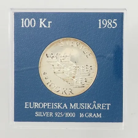 Minnesmynt, Europeiska Musikåret, 1985, nominellt värde 100kr, Ø32mm, plastetui, 925/1000 silver Vikt: 16,2 g