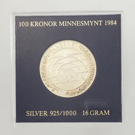 Minnesmynt, Ø 32mm, Förtroende, säkerhet, nedrustning, Stockholm Europa, Sverige 1984, nominellt värde 100kr, plastetui, silver 925/1000  Vikt: 15,8 g