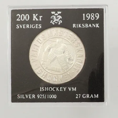 Minnesmynt, Ø ca 35mm, Ishockey VM, 1989, nominellt värde 200Kr, plastetui, 925/1000, silver Vikt: 26,9 g