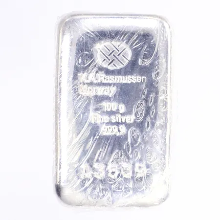 Silvertacka K.A. Rasmussen, Norge, serienummer A3339, 50x30mm, inplastad, silver 999/1000 Vikt: 100 g