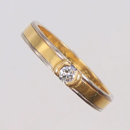 Ring tvåfärgad med diamant 1xca0,15ct stl 18, bredd 3mm, gravyr, HE (Heribert Engelbert) Stockholm 1987, 18K Vikt: 3,7 g