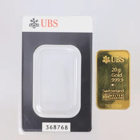 Guldtacka UBS serienr 368768 (borrad), 24K Vikt: 20 g