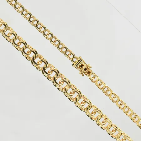 Collier Bismarck, doserad, längd 42½ cm, bredd 4-8 mm, 18K. Vikt: 25 g