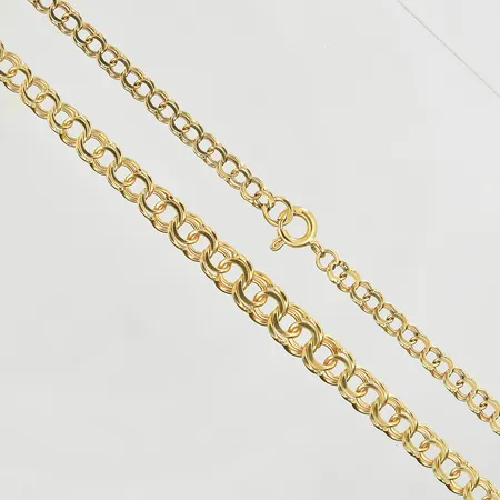 Collier Bismarck, doserad, längd 46½ cm, bredd 3-5 mm, 18K. Vikt: 10,5 g