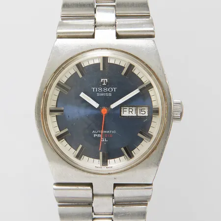 Herrur Tissot PR 516 GL, stål, automatisk, 35,5mm, boettnr: 46672-3X, Cal. 794 ( 1968-1972), verknr: 14134503, dag, datum, stållänk, viklås, 21cm, inga tillbehör.