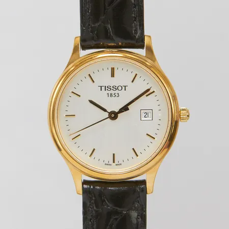 Damur Tissot, 18K, quartz, 26,9mm, ref: T913210A, snr: 13AN0003377, opersonlig gravyr, datum, batteribyte, läderband, bygelspänne, etui