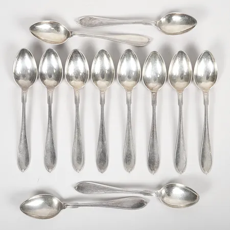 Tolv Kaffeskedar, modell "Svensk Spetsig", längd: 12cm, Guldsmedsaktiebolaget, Stockholm 1931, 830/1000 silver. Vikt: 146,8 g