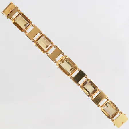 Armband med 5st smaragdslipade citriner, totalt ca 75,00ct, längd 16cm, bredd 15mm, tillverkad av Smyckeboden Olle Torrestad, Halmstad, år 1966, 18K guld,  Vikt: 46,9 g