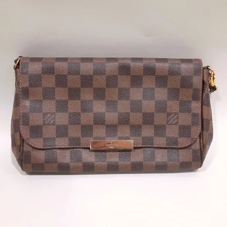 Väska Louis Vuitton Favorite MM Damier Ebene canvas, datumkod FL2196, ca 24x15x5cm, guldfärgade detaljer med färgbortfall, axelrem med slitage, fläckar invändigt, inga tillbehör. 