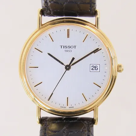 Herrur Tissot, 18K, quartz, datum, ref-nr: G668330, serie-nr: 11LA0002918, Ø34mm, datum, safirglas, läderband original, datum, batteribyte krävs, gravyr, box, manual, garantikort ej ifyllt, bruttovikt: 34,5g