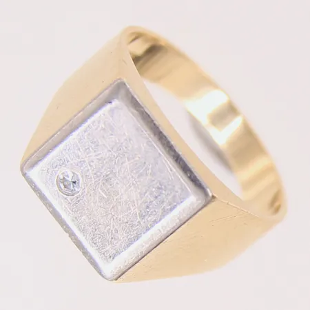 Klackring med diamant ca 0,04ct, stl 20¼, bredd 4-13mm, vitguldsdetaljer, 18K  Vikt: 10,5 g