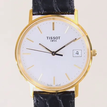 Herrur Tissot, 18K, quartz, boett-nr: H674.330, safirglas, med läderband original, datum, gravyr, batteribyte krävs, etui med slitage, bruttovikt: 29,7g