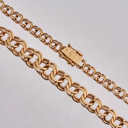 Collier i 18K guld, 44,5cm, docerat Bismarck, bredd 4,4-7,6mm, tillverkad av Curt Hallberg Guldvarufabrik Ab, år1970, vikt 18,23g.