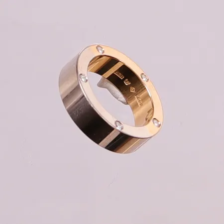 Ring, 5x diamanter ca 0,15ctv, Ø16¾, bredd:6mm, röd/vitguld, 18K 15,7g.