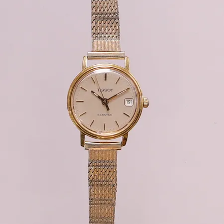 Damur Tissot 18K, 22mm, quartz, band ej guld, sliten, gravyr, går ej, bruttovikt 23,9g.