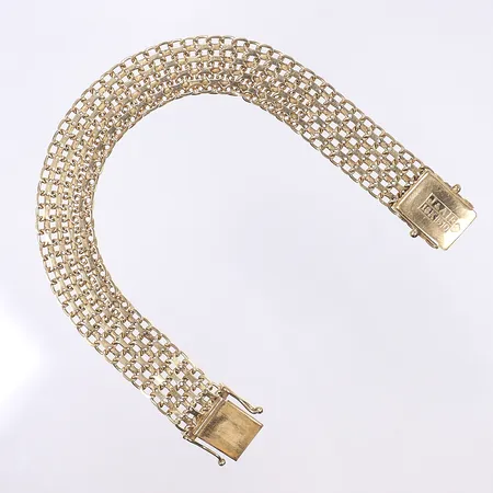 Armband X-länk, 19cm, bredd 13mm, en länkdel något ojämn, 18K Vikt: 20,5 g