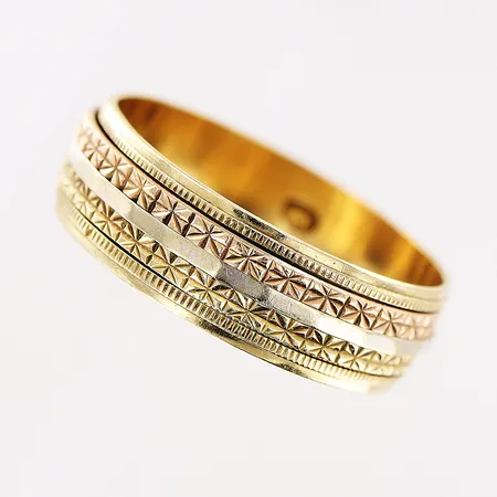 Ring, stl 19¾, bredd 6mm, rörlig mittdel, vitgulds detalj, 18K.  Vikt: 3,9 g