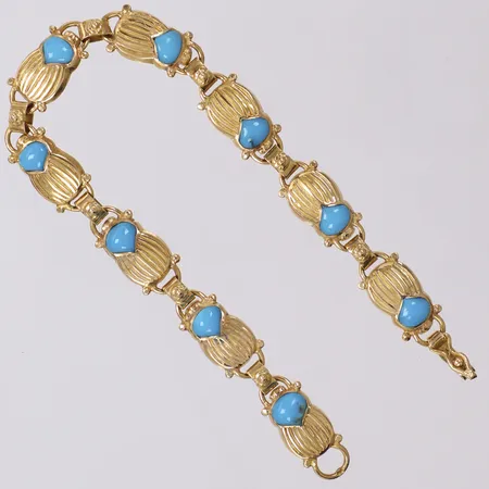 Ett armband med turkos emalj, längd 17,5cm, bredd 7mm, utländsk stämpel, 18K Vikt: 10,9 g