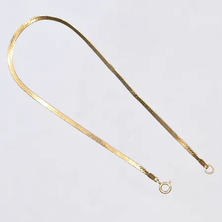 Armband, längd 18 cm, bredd 2 mm, små vridna länkar, 14K.  Vikt: 1 g