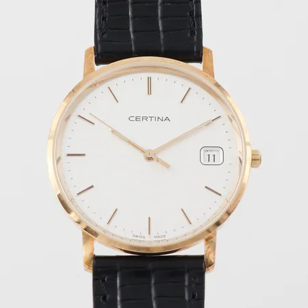 Herrur Certina, diameter 33 mm, fungerar ej troligen batteriet, gravyr, oanvänt skick, etui medföljer, 18k.